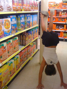 Handstand in the Cereal Aisle - Giuliano M.